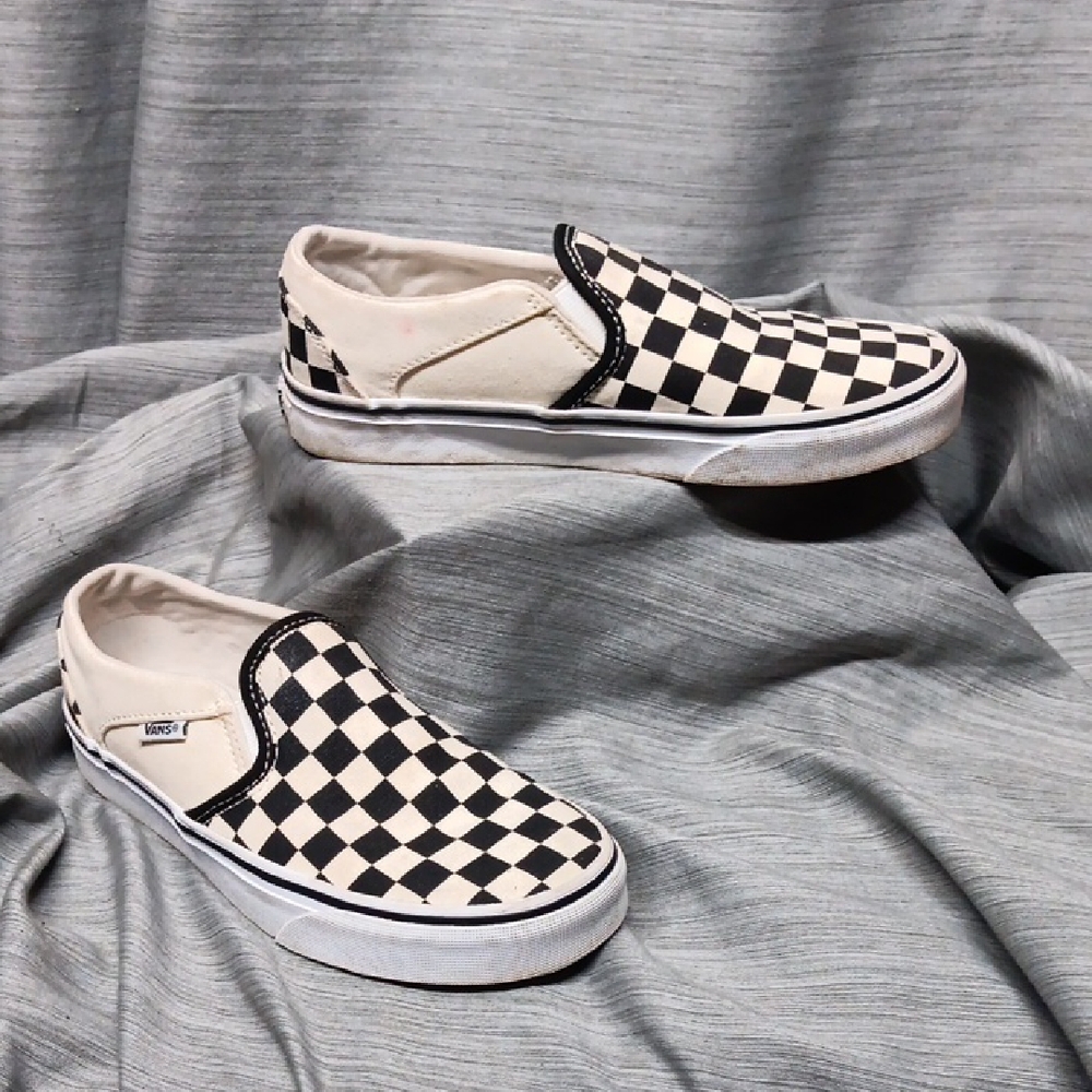 Sold.  Vans Black and White Checkerboard Slip-Ons